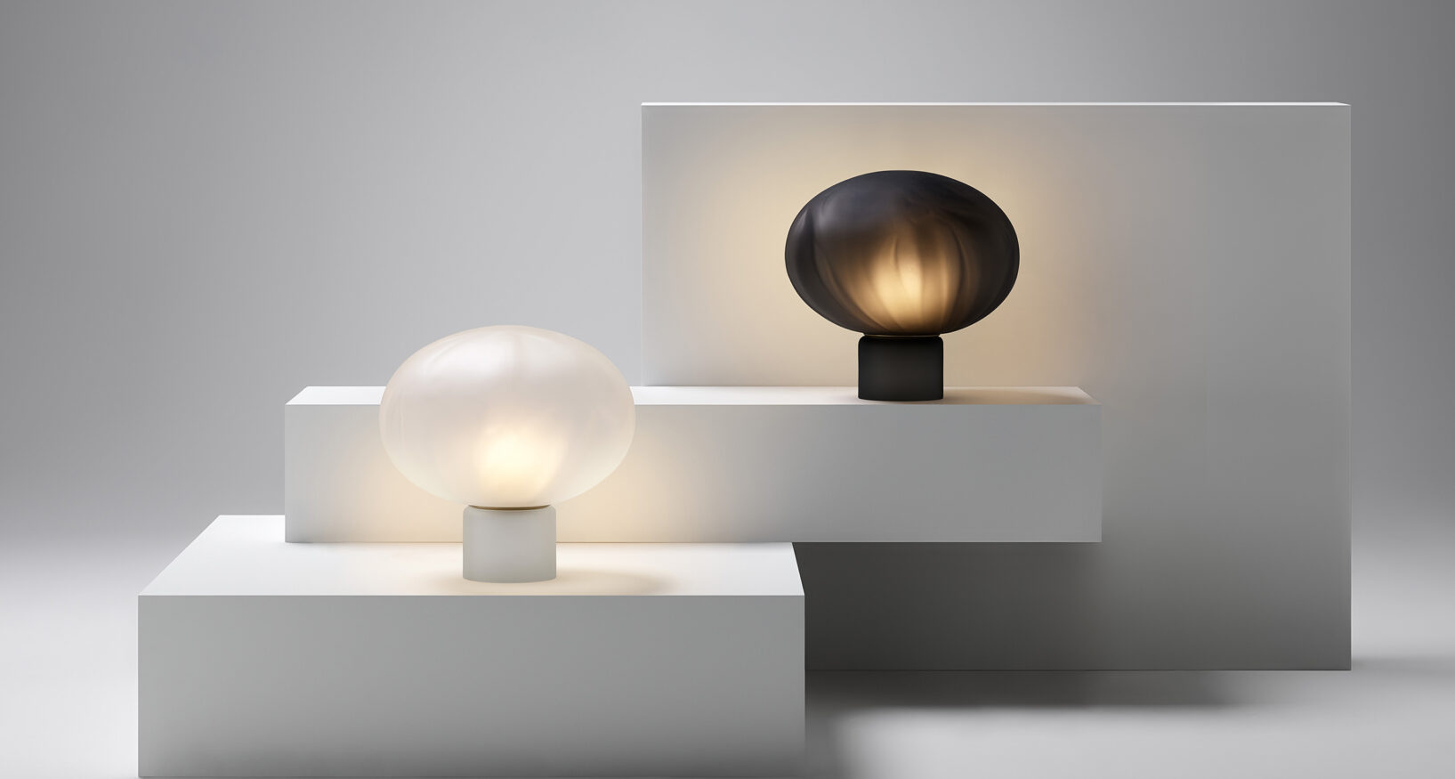 Ross Gardam Méne table lamps in frosted black glass and frosted clear glass